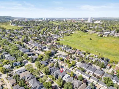 an aerial view of a residential neighbourhood with houses at Calgary Mini Manor Near DT Sleeps 8 Prime Location in Calgary