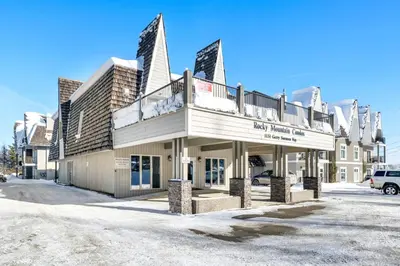 a building with a balcony on top of it at Kimberley Escape: 1BR+Studio w/ Hot Tub, Pool, BBQ in Kimberley