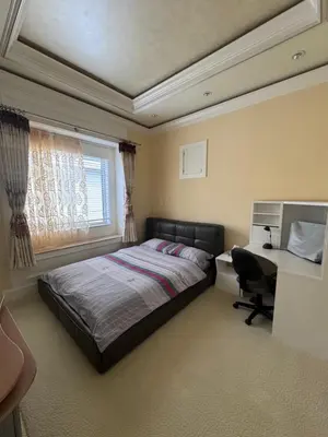 a bedroom with a bed and a desk and a window at Sweet Graceful Home Queen size bedroom for 2 Guests in Richmond