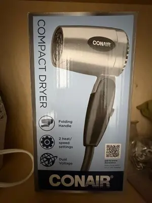 a box of a conair hair dryer at Downtown Vancouver Rooms - Walk to SkyTrain & BC Place, Free Parking & Fast Wi-Fi in Vancouver