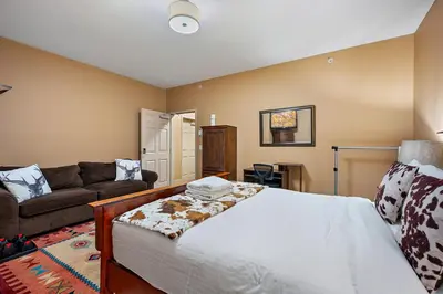 a living room with a bed and a couch at Blackrock 6 in Big White