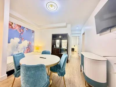 a room with a table and chairs and a bed at Private Guest Suite, One Parking Space in Maple Ridge District Municipality