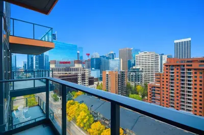 a balcony with a view of a city at 1506 First and Park in Calgary