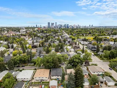an aerial view of a residential neighborhood with a city skyline at Entire Home - 2 Separate Units in Calgary