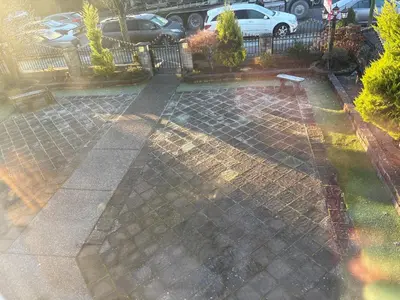 a patio with a bench and a fence at private 1br guest suite Vancouver in Vancouver