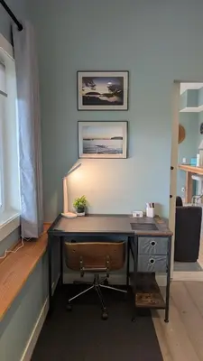 an office with a wooden desk with a chair at 'The Lookout' Sea View Suite w Hot tub in Shirley