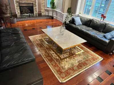 a living room with a couch and a coffee table at Cozy & Equipped Room Right Next to Mall & Skytrain in Vancouver