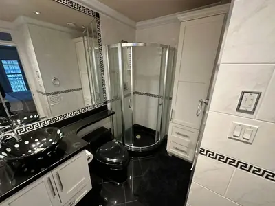 a bathroom with a shower and a sink at Luxury Room with Private Washroom in Prime Location in Vancouver