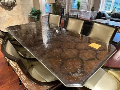 a large marble table with chairs around it at Luxury Room with Private Washroom in Prime Location in Vancouver