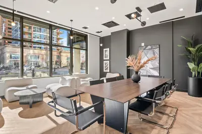 a dining room with a table and chairs at Incredible DT Views| King bed| Rest and Unwind in Calgary