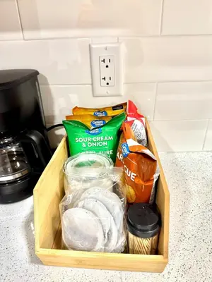 a wooden box filled with different types of food at Stylish and Cozy 2-Bedroom Guest Suite in West Edmonton in Edmonton