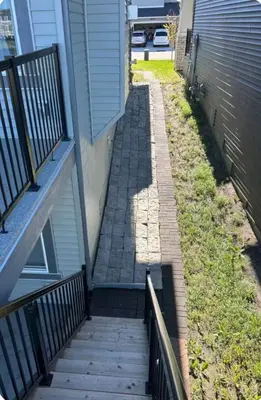 a stairway leading up to a house at Pond view Place in Airdrie