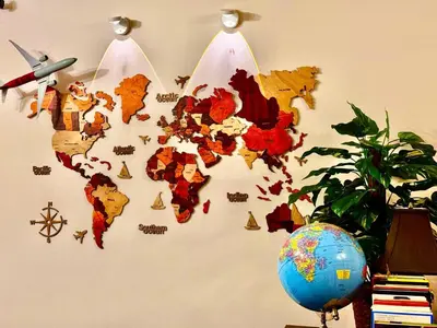 a map of the world on a wall with hangers at 2BR sweet suite in Nanaimo