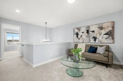 a living room with a couch and a glass table at Modern 4BR Retreat 3 Baths Near to Banff&Airport in Calgary