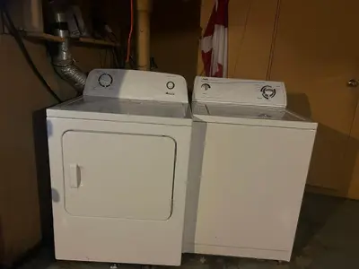 two white appliances are sitting next to each other at Vancouver Budget Rooms Near Beach & Transit - Fast WiFi & Free Parking in Vancouver
