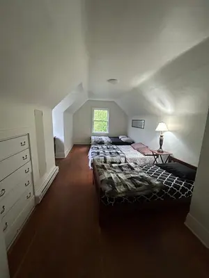 a bedroom with two beds and a window at Budget Vancouver Stay - Airport & Downtown 10 & 15 Min, Free Parking & Fast Wifi in Vancouver