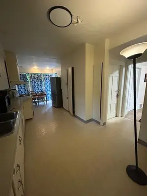 a room with a kitchen and a living room at Budget Vancouver Stay - Airport & Downtown 10 & 15 Min, Free Parking & Fast Wifi in Vancouver