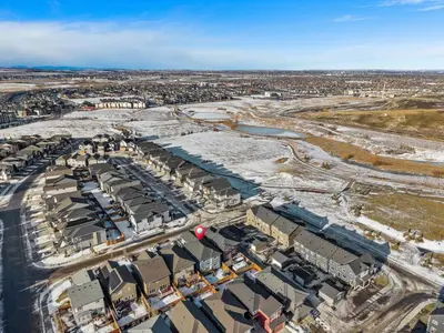 an aerial view of a city with a river and buildings at Spacious 8 Bedroom Family Retreat in Calgary