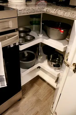 a kitchen with a stove and some pots and pans at Cozy and Private Guest Suite in West Edmonton in Edmonton