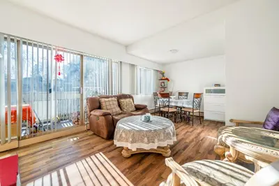 a living room with a couch and a table at Central Vancouver 1BR Close to Transit in Vancouver