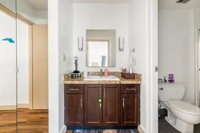 a bathroom with a sink and a toilet at Central Vancouver 1BR Close to Transit in Vancouver