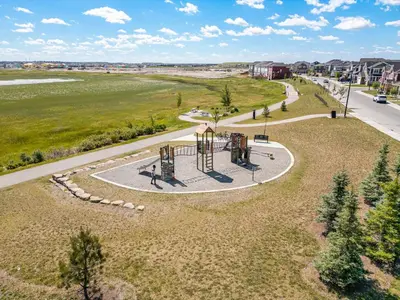 an aerial view of a park with a playground at Family 3BR Suite w Kid's Play Tent, FREE Banff Pass, Netflix! in Calgary