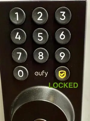 a close up of a remote control with numbers at Cozy 1-Bed Basement Suite in Calgary