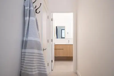 a bathroom with a sink and a mirror at Ridgeline Penthouse by Revelstoke Vacations in Revelstoke