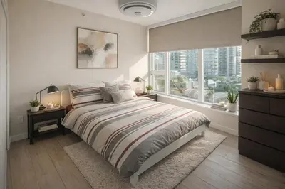 a bedroom with a bed and a large window at Chic 2BR Tinseltown Condo - Walk to Stadiums in Vancouver