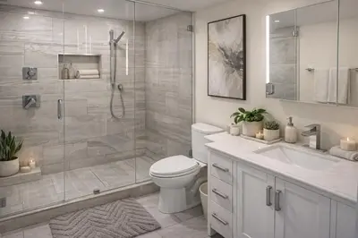 a bathroom with a shower and a toilet and a sink at Chic 2BR Tinseltown Condo - Walk to Stadiums in Vancouver
