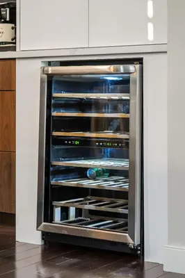 an oven with its door open in a kitchen at Luxury Haven | Pool | Hot Tub & Sauna |Outdoor BBQ in Calgary