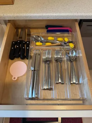a drawer filled with utensils in a kitchen at Rosie Cozy Retreat in Victoria