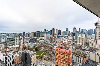 an aerial view of a city with tall buildings at Luxury High Rise at Gastown Near BC Place in Vancouver