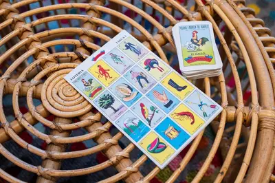 a board game on a wicker basket next to a container at Casa DT Vancouver - Mexican Theme in Vancouver