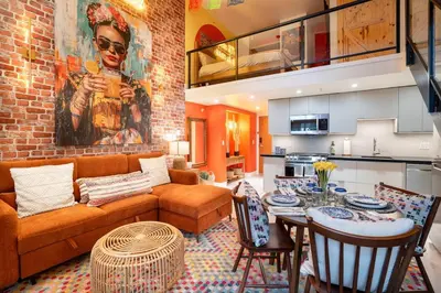 a living room with a couch and a table at Casa DT Vancouver - Mexican Theme in Vancouver