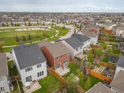 an aerial view of a residential neighborhood with houses at A beautiful home in Airdrie in Airdrie