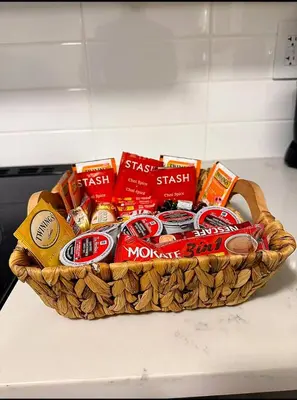 a basket of food and snacks on a counter at Luxury 2-Bedroom Suite at Bear Mountain Victoria in Langford