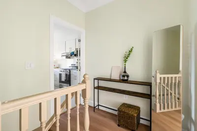 a staircase in a home with a stair case at Modern Vancouver Private Room-15 Mins to Downtown in Vancouver