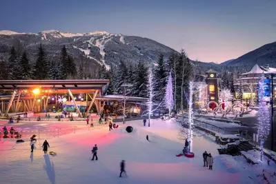 a group of people walking around a ski resort at Heart of Whistler Village, Mountain Views, Pool & Hot Tub in Whistler