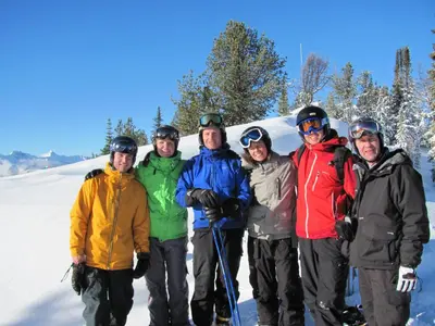a group of people posing for a picture in the snow at Panorama Mountain Resort - Horsethief Lodge with Fairmont Creek in Panorama