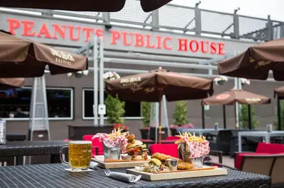 a table with two plates of food and drinks on it at Carriage House Hotel and Conference Centre in Calgary