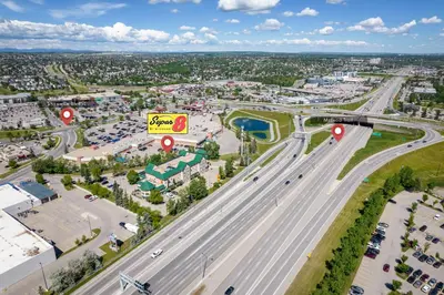 an aerial view of a highway with traffic at Super 8 by Wyndham Calgary Shawnessy Area in Calgary