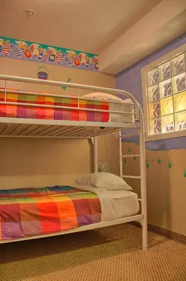 a bunk bed in a room with a bunk bedutenewayewayangering at Holiday Inn Hotel & Suites Osoyoos by IHG in Osoyoos
