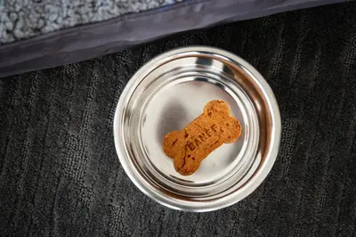 a cookie sitting on top of a glass bowl at Elk + Avenue Hotel in Banff