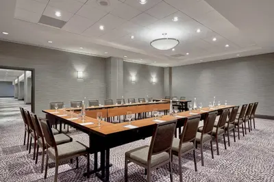 a large conference room with a long table and chairs at The Westin Edmonton in Edmonton