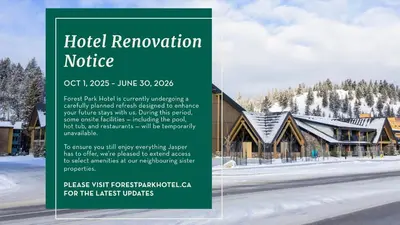 a sign for a hotel removal notice in front of a building at Forest Park Hotel in Jasper