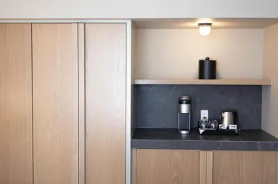 a coffeemaker sitting on a counter in a room at Forest Park Hotel in Jasper