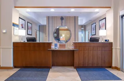 a mirror at the front of a hair salon at Sandman Hotel and Suites Squamish in Squamish