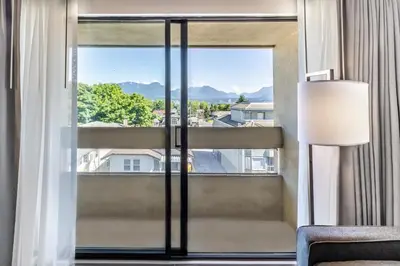 a room with a large window with a view at Atrium Hotel Vancouver in Vancouver