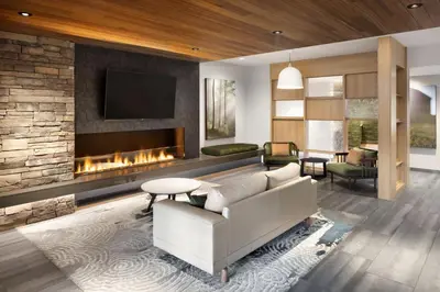 a living room with a couch and a fireplace at Fairfield Inn & Suites by Marriott West Kelowna in West Kelowna